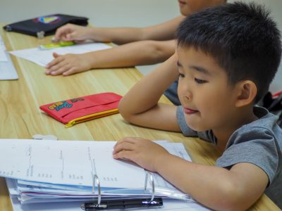 Boy attending a Primary 1 English enrichment lesson